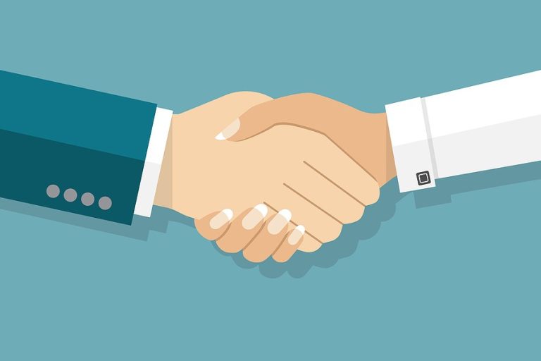 Handshake between two business people.