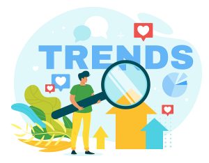 Person with large magnifying glass on a background saying "Trends," describing social media and marketing trends.