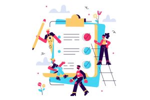 Marketers gathering around large checklist for social media marketing.