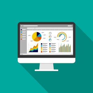 Website analytics shown through charts on a monitor